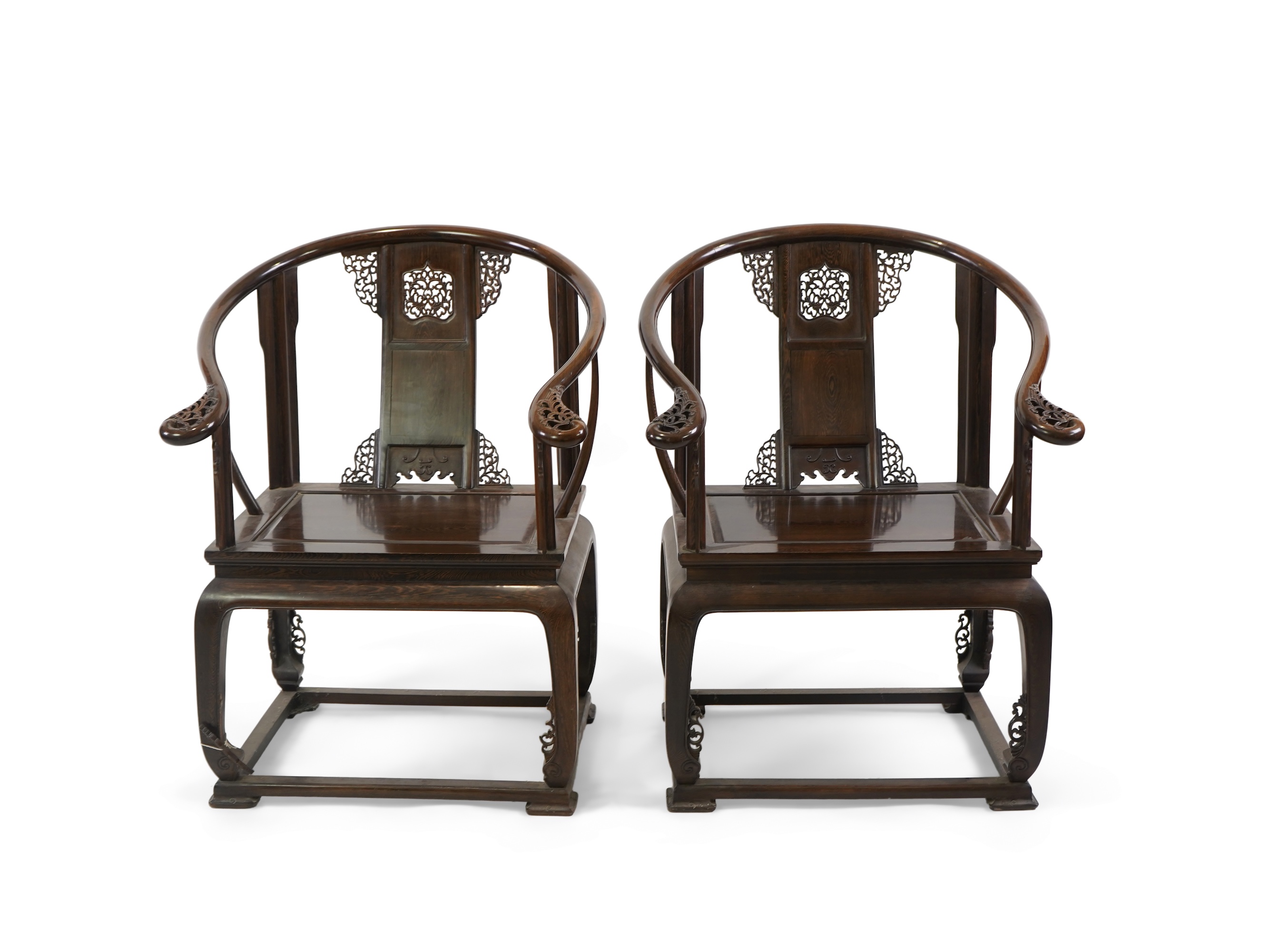A pair of Chinese jichimu horseshoe shaped armchairs and a matching table, 19th/20th century